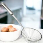 Lot de 12 (Soit 3,08€ unité) : Écumoires en inox - 14cm