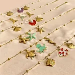 Lot de 12 (1,95€ Pièce) : Bracelet Breloques OCEAN 2 dorés et 1 coloré - Acier Inoxydable
