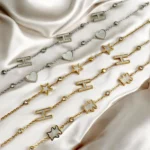 Lot de 6 (2,21€ Pièce) : Bracelet doré et argenté Motifs Lettres/Coeurs/Etoiles - Acier Inoxydable