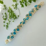 Coussin de 20 (1,85€ unité) : Mélange de bague ajustable dorée et turquoise