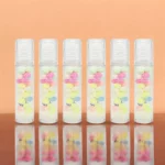 Présentoir de 24 (soit 0,82€ unité) : Roll-On Huile à lèvres DULCE COLOR "Barbe à Papa" - Easy Paris