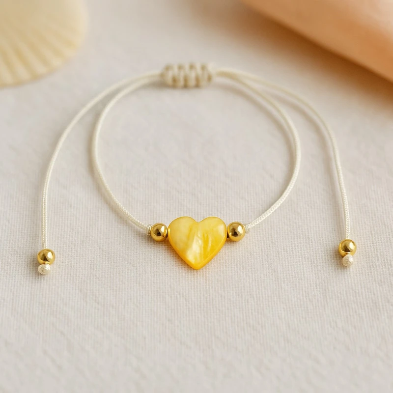 bracelet corde doré en solde jaune Lot de 10 (0,50€ Pièce) : Bracelet Coeur Nacré & Dorées - jaune – Image 1