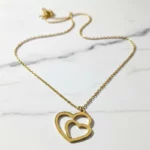 ✨Collier Pendentif "Amour Uni" Doré💎Acier Inoxydable de Haute Qualité