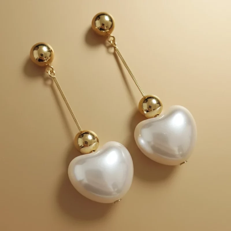 💖 Boucles d'Oreilles Haut de Gamme "Cœur de Perle" Tombantes - Finition Dorée Tendance ✨