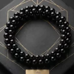 📿 Bracelet Noir Brillant "Éclat de Perles" – Collection Couleurs & Lumière
