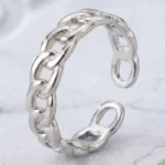 🌟 Pack Revente Premium : Collection 12 Bagues Argentées "Chaine" Acier Inoxydable & Présentoir Coussin
