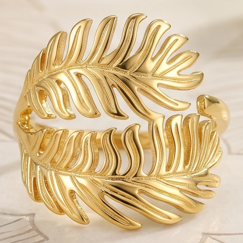 grossiste en bague acier inoxydable doré et argent (12) 🌟 Pack Revente Premium : Collection 12 Bagues Dorées "Feuille" Acier Inoxydable & Présentoir Coussin – Image 1