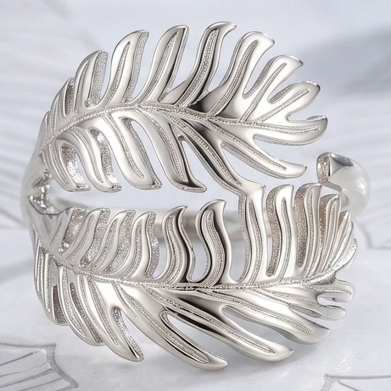 grossiste en bague acier inoxydable doré et argent (4) 🌟 Pack Revente Premium : Collection 12 Bagues Argentées "Feuille" Acier Inoxydable & Présentoir Coussin – Image 1