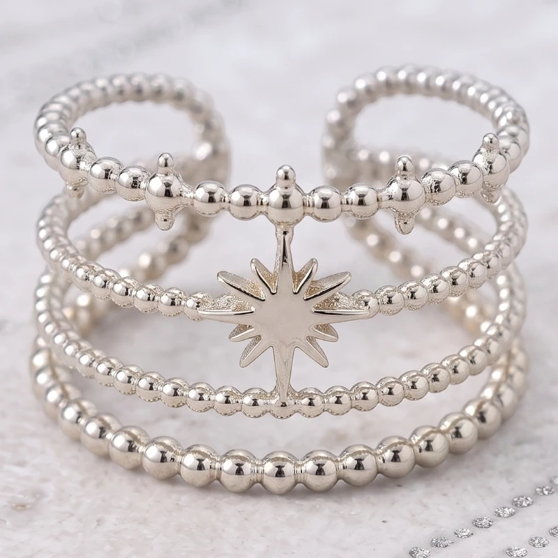 grossiste en bague acier inoxydable doré et argent (9) 🌟 Pack Revente Premium : Collection 12 Bagues Argentées "Étoile" Acier Inoxydable & Présentoir Coussin – Image 1